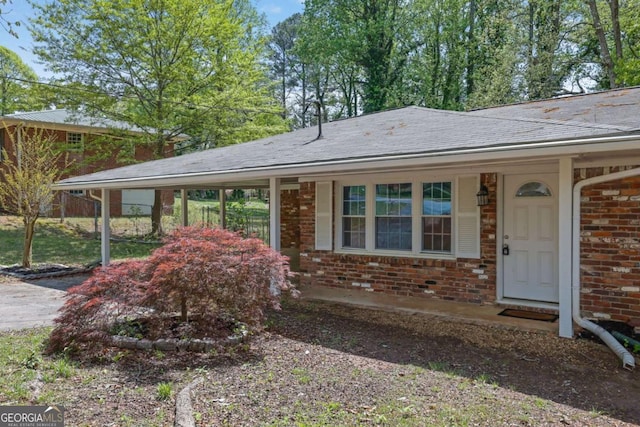 1093 Lanier Dr SW, Marietta, GA 30060 - view of front of home featuring a carport and brick siding