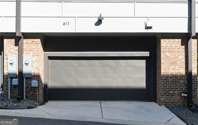 garage featuring driveway
