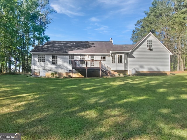 823 New Hope Rd, Mcdonough, GA 30252 - back of property featuring a wooden deck and a lawn