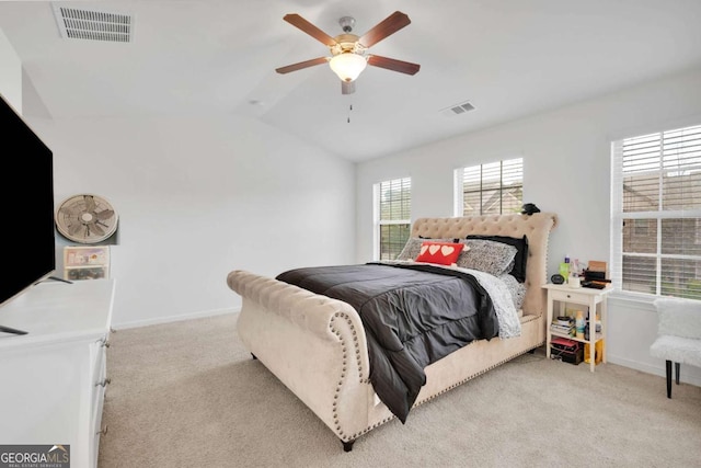bedroom with visible vents, baseboards, and light colored carpet