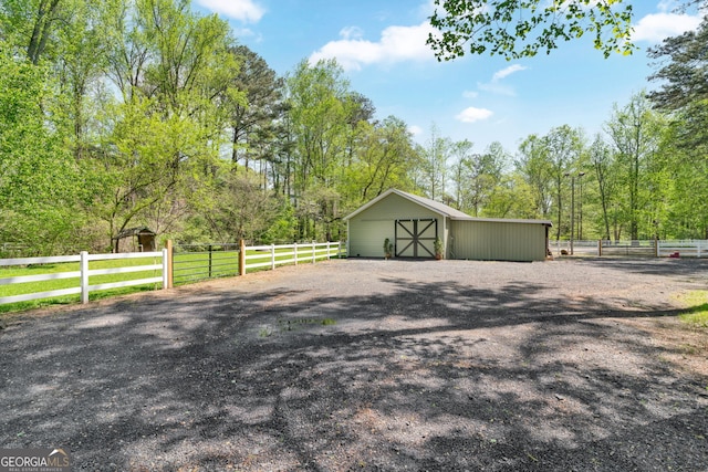 garage featuring fence