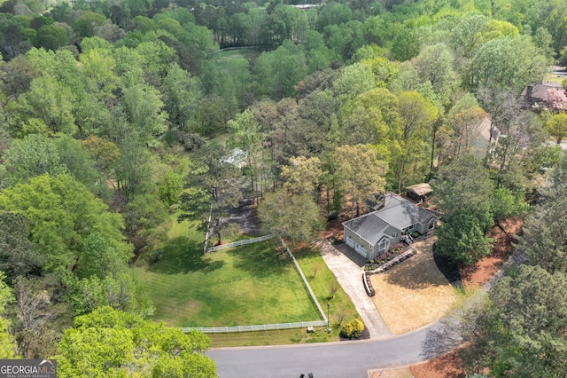 aerial view with a wooded view