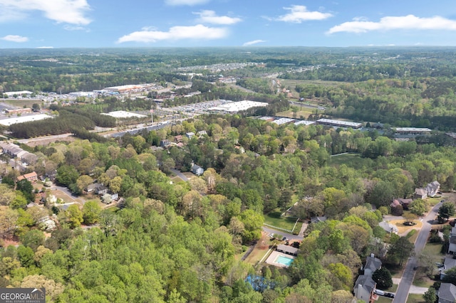 bird's eye view with a view of trees