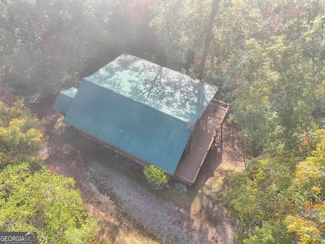 drone / aerial view featuring a forest view