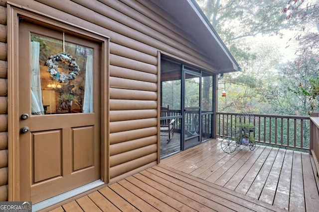 deck featuring a sunroom