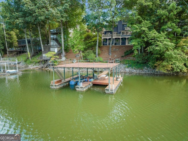 view of dock with a water view