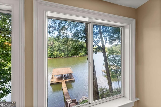 doorway to outside with a water view