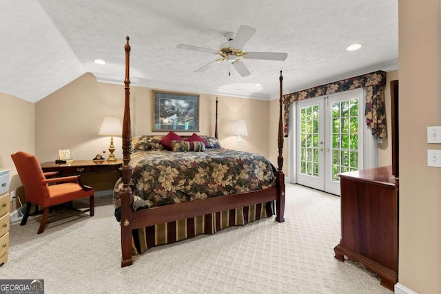 bedroom with access to outside, a textured ceiling, ornamental molding, carpet flooring, and french doors