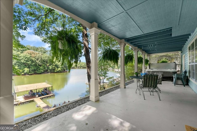 view of patio / terrace featuring a water view and a floating dock
