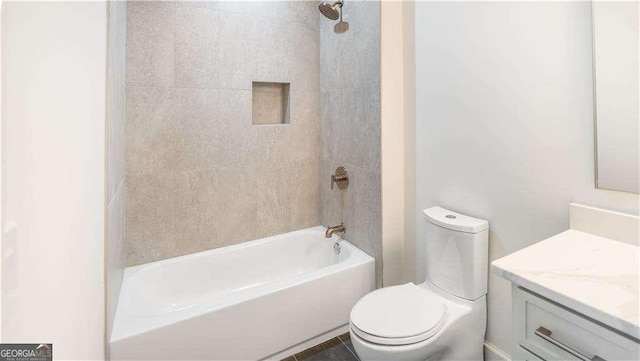 full bath featuring toilet, vanity, and shower / bathtub combination