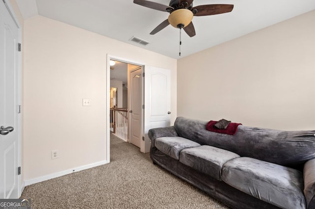 272 William Nye Dr SE, Atlanta, GA 30315 - living room featuring light colored carpet, baseboards, a ceiling fan, and visible vents