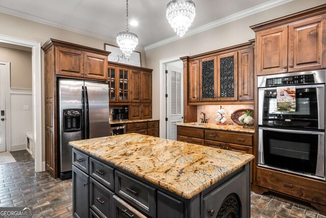 240 Trotters Rdg, Fayetteville, GA 30215 - kitchen with a chandelier, glass insert cabinets, light stone counters, and appliances with stainless steel finishes