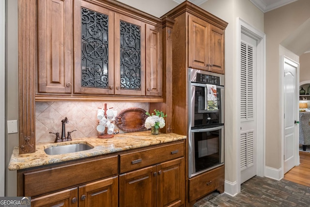 240 Trotters Rdg, Fayetteville, GA 30215 - kitchen with tasteful backsplash, light stone counters, a sink, and double oven