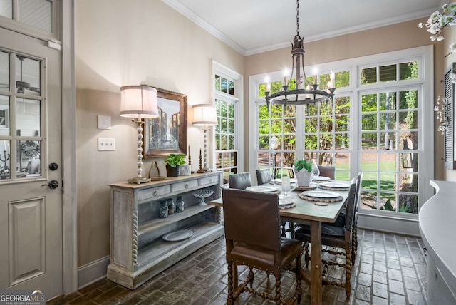 240 Trotters Rdg, Fayetteville, GA 30215 - dining room with ornamental molding, brick floor, a chandelier, and a wealth of natural light