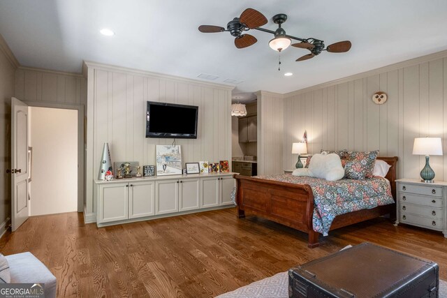 240 Trotters Rdg, Fayetteville, GA 30215 - bedroom with visible vents, crown molding, a ceiling fan, and wood finished floors