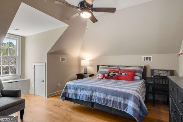 240 Trotters Rdg, Fayetteville, GA 30215 - bedroom featuring visible vents, ceiling fan, vaulted ceiling, and wood finished floors