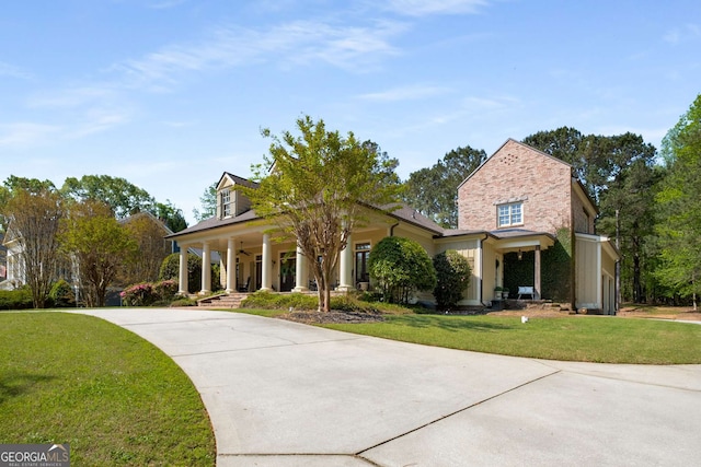 240 Trotters Rdg, Fayetteville, GA 30215 - view of front of property featuring a front yard, a porch, and driveway