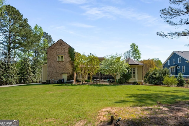 240 Trotters Rdg, Fayetteville, GA 30215 - rear view of property with a lawn