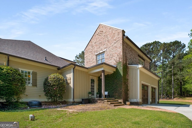 240 Trotters Rdg, Fayetteville, GA 30215 - view of front of house with an attached garage, driveway, and a front yard