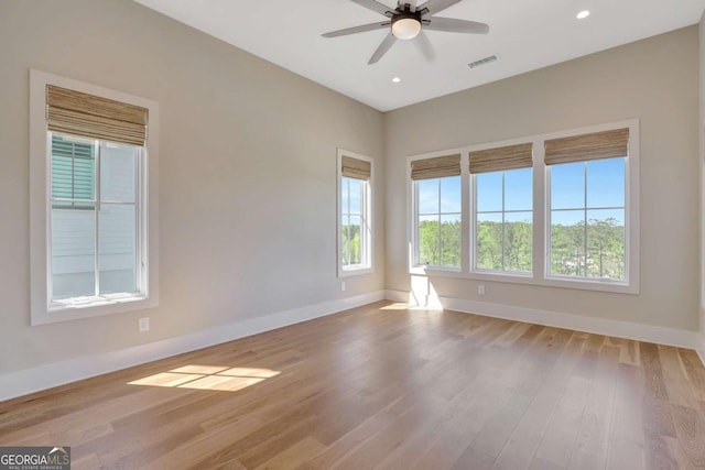 1130 Lupo Loop, Chattahoochee Hills, GA 30268 - spare room with wood finished floors, a ceiling fan, and recessed lighting