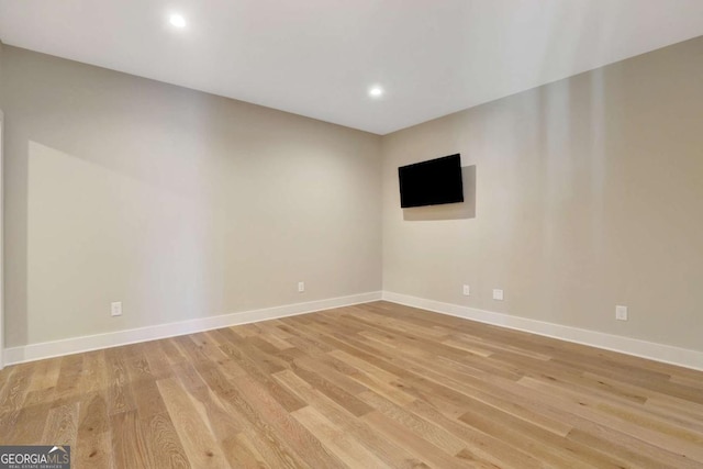 1130 Lupo Loop, Chattahoochee Hills, GA 30268 - unfurnished room featuring light wood-style flooring and recessed lighting