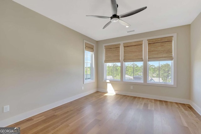 1130 Lupo Loop, Chattahoochee Hills, GA 30268 - spare room featuring plenty of natural light, ceiling fan, and light wood finished floors