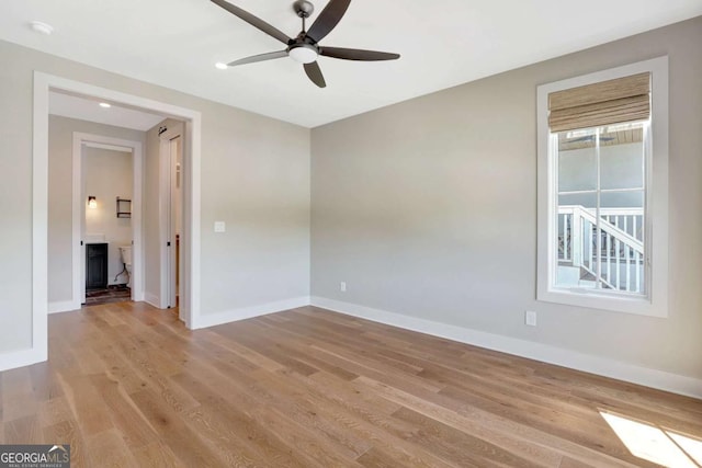 1130 Lupo Loop, Chattahoochee Hills, GA 30268 - spare room with a ceiling fan, light wood-style floors, a smoke detector, and recessed lighting