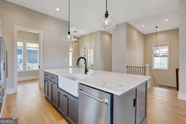 1130 Lupo Loop, Chattahoochee Hills, GA 30268 - kitchen featuring stainless steel dishwasher, light wood-style floors, light stone counters, and recessed lighting