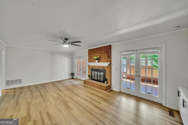 unfurnished living room featuring french doors, visible vents, a ceiling fan, and light wood-style floors