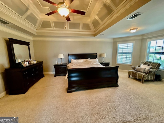 carpeted bedroom with crown molding, ceiling fan, baseboards, and visible vents