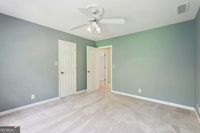 918 Guinevere Way SW, Lilburn, GA 30047 - unfurnished bedroom featuring carpet and ceiling fan