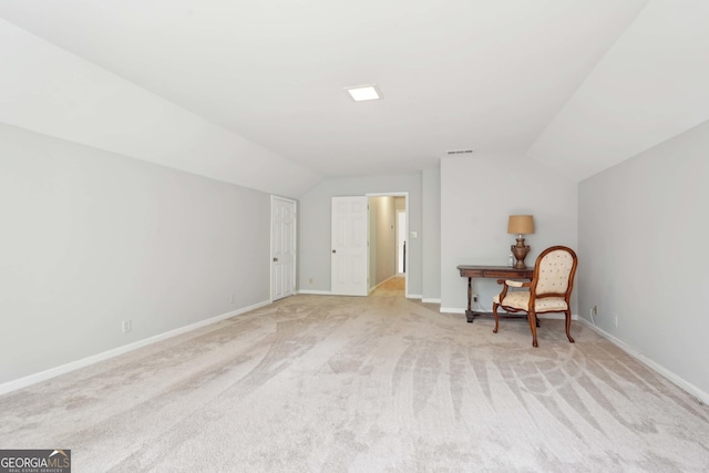 918 Guinevere Way SW, Lilburn, GA 30047 - additional living space featuring lofted ceiling and light colored carpet