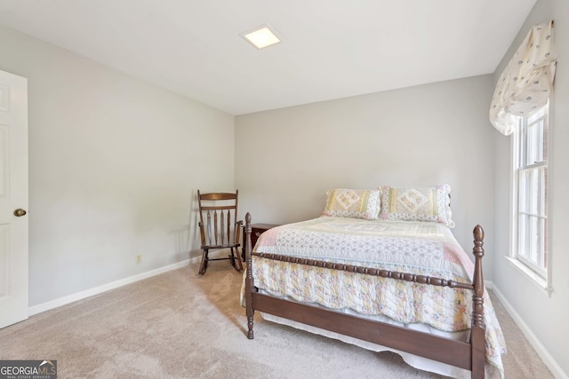 918 Guinevere Way SW, Lilburn, GA 30047 - carpeted bedroom featuring baseboards