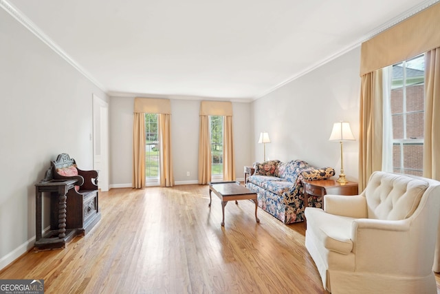 918 Guinevere Way SW, Lilburn, GA 30047 - living area featuring light wood-style floors and crown molding