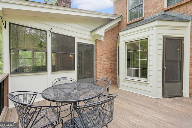 918 Guinevere Way SW, Lilburn, GA 30047 - wooden terrace with outdoor dining area