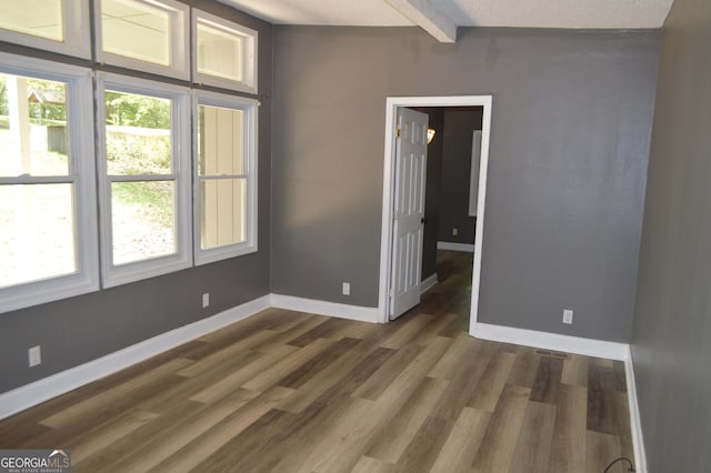 66 Topaz Ln, Royston, GA 30662 - interior space with dark wood-style flooring, beamed ceiling, and baseboards