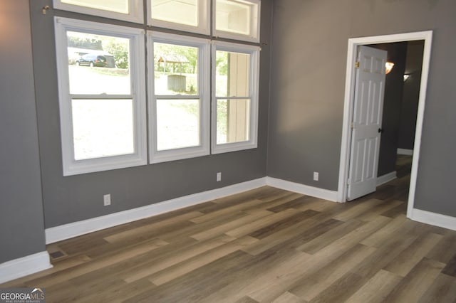 66 Topaz Ln, Royston, GA 30662 - unfurnished room featuring baseboards and dark wood finished floors
