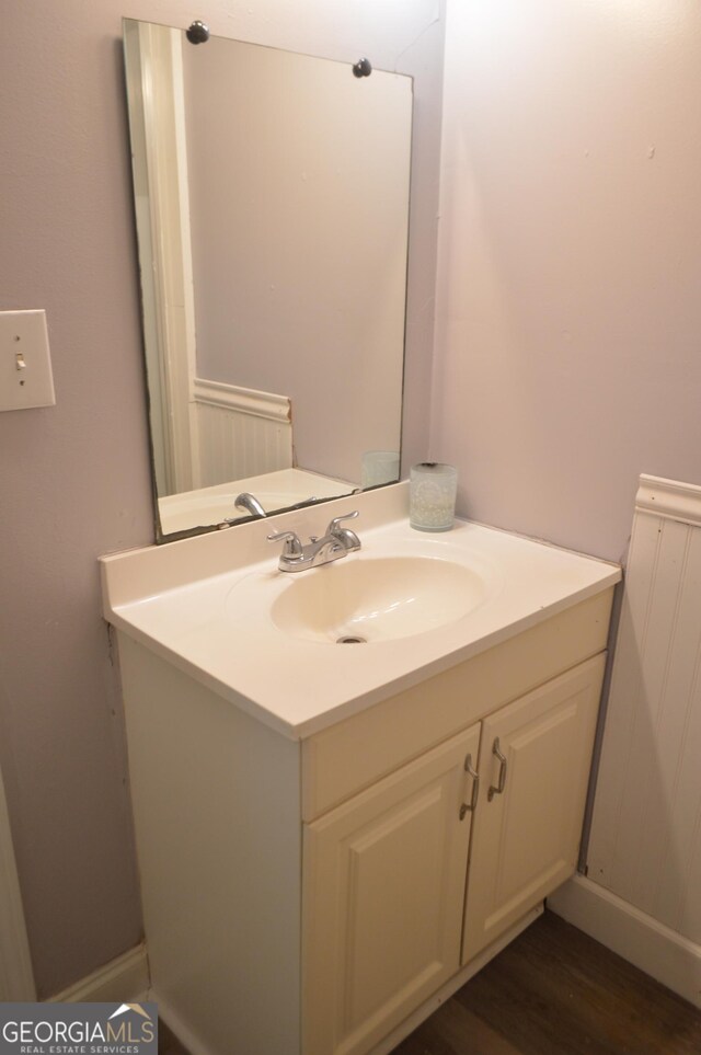 66 Topaz Ln, Royston, GA 30662 - bathroom with vanity and wood finished floors