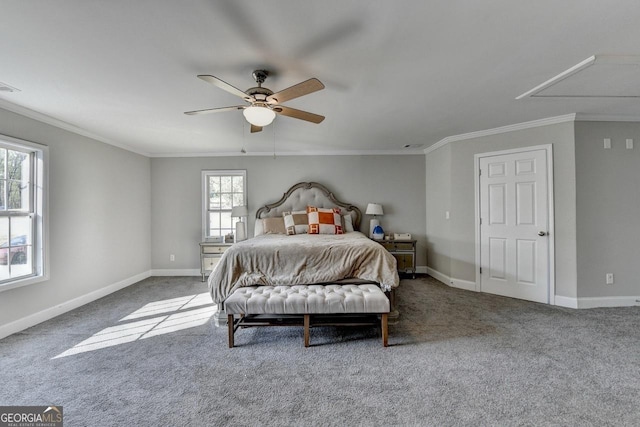 carpeted bedroom with attic access, visible vents, baseboards, and crown molding
