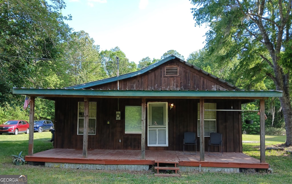 11284 Johnson St, St George, GA 31562 - back of property featuring a lawn