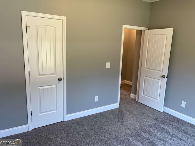 202 Gamel Rd, Dallas, GA 30157 - unfurnished bedroom with baseboards and carpet