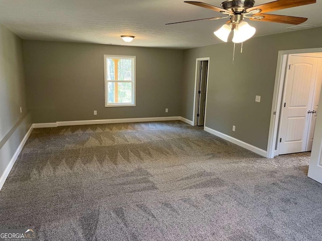 202 Gamel Rd, Dallas, GA 30157 - carpeted spare room with baseboards, a ceiling fan, and visible vents