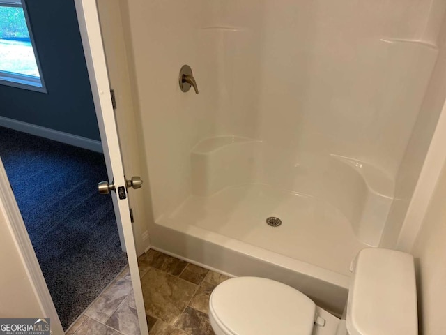 202 Gamel Rd, Dallas, GA 30157 - bathroom with toilet, baseboards, and a shower