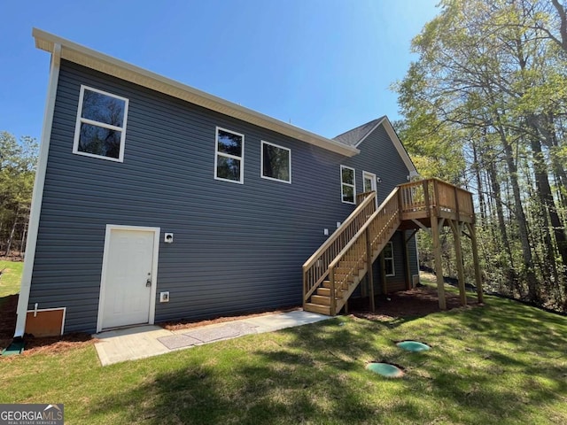 202 Gamel Rd, Dallas, GA 30157 - back of property with stairs, a deck, and a yard