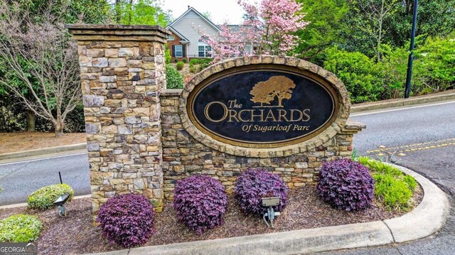 view of community sign