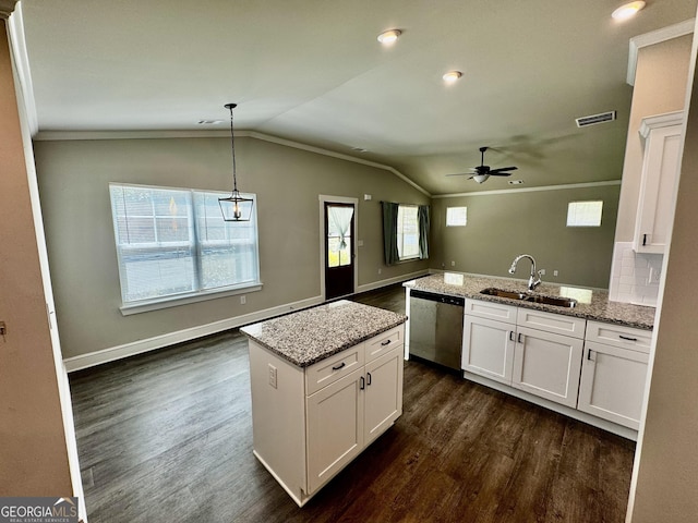 1037 E Doyle St, Toccoa, GA 30577 - kitchen with dishwasher, dark wood-style floors, white cabinets, ceiling fan, and open floor plan