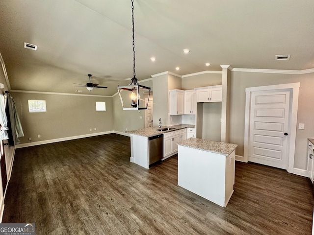 1037 E Doyle St, Toccoa, GA 30577 - kitchen featuring dishwasher, ornamental molding, ceiling fan, open floor plan, and white cabinets
