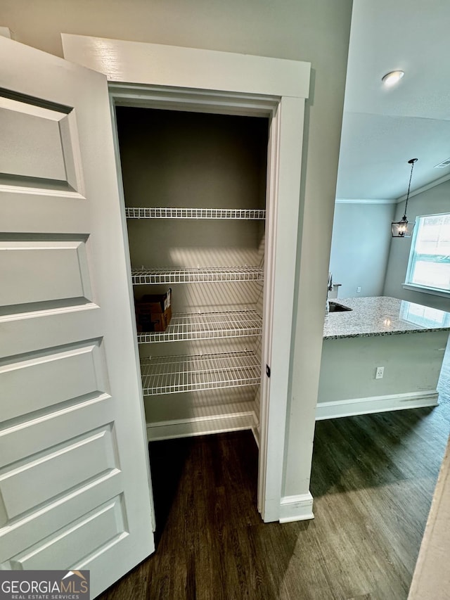 1037 E Doyle St, Toccoa, GA 30577 - detailed view of wood finished floors and a sink