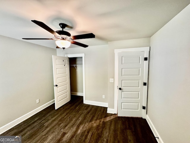 1037 E Doyle St, Toccoa, GA 30577 - unfurnished bedroom with dark wood-type flooring, a closet, and ceiling fan