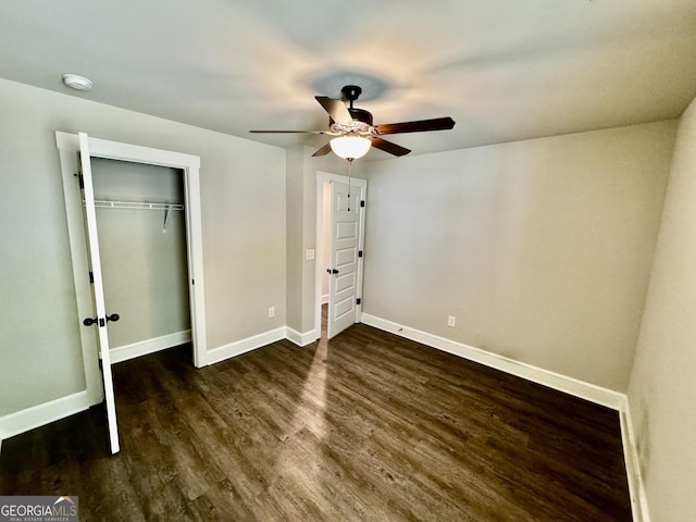 1037 E Doyle St, Toccoa, GA 30577 - unfurnished bedroom featuring wood finished floors, a closet, and a ceiling fan